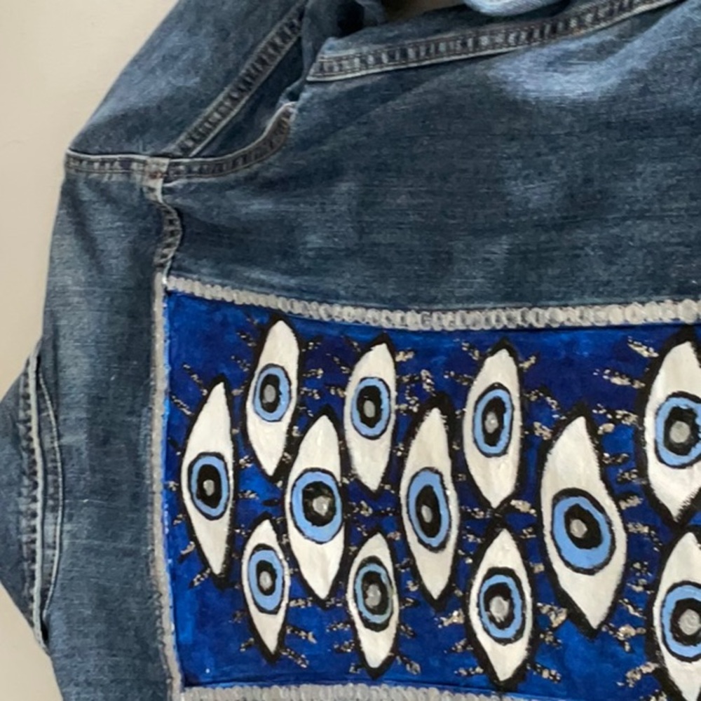 Levi’s original trucker jacket hand painted with evil eyes